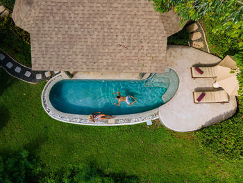 High angle view of slide on grassy field