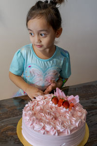 Asian cute little princess at 3rd birthday party.