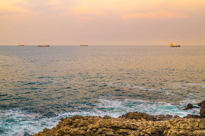 Scenic view of sea against sky during sunset