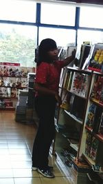 Portrait of a young woman sitting on bench