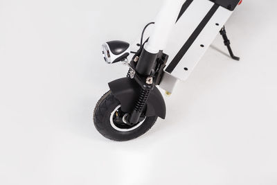 High angle view of push scooter on white background