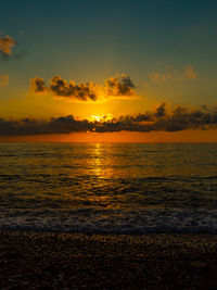 Beautiful sky filling sunset over the sea. film photography effect.