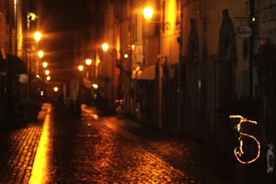 Close-up of illuminated lights at night
