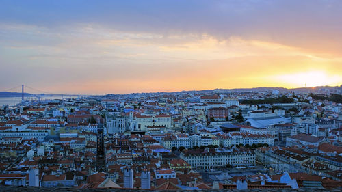 High angle view of townscape against sky during sunset