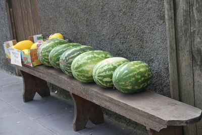 Vegetables in container on wood