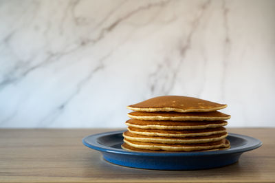 Close-up of cookies in plate on table