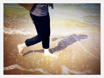 Woman standing on beach
