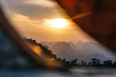 Scenic view of mountains against sky during sunset