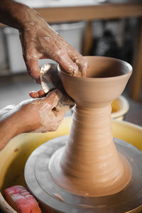 Cropped image of man working at workshop