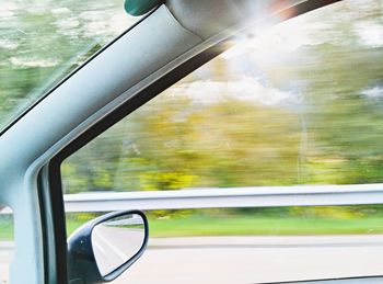 Reflection of car on road