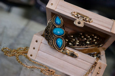 Old fashioned jewelry in wooden box