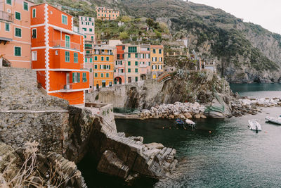 High angle view of buildings by sea