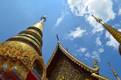 Low angle view of temple against building