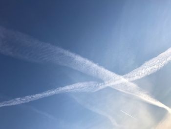 Low angle view of vapor trail in sky