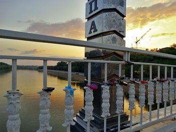 Built structure against cloudy sky at sunset