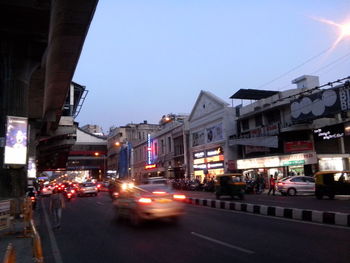 Traffic on road in city at night