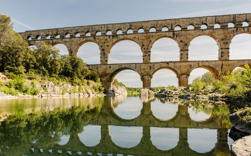 Arch bridge over river