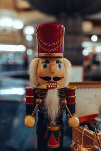 Christmas toy wooden soldier nutcracker figurine. traditional festive decor, new year magic details.