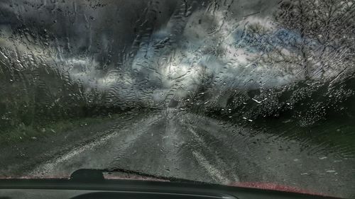 Road seen through car windshield