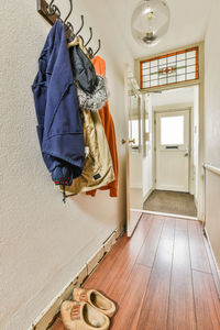 Low section of woman standing in room