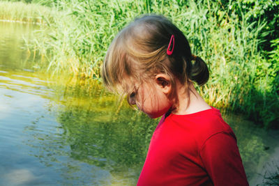 Portrait of a pensive, attentive child. recreation and observation in nature