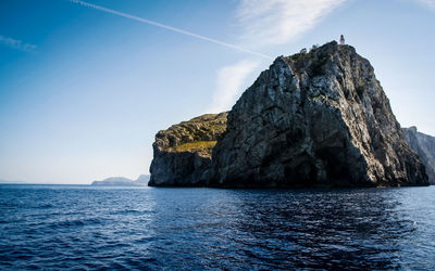 Scenic view of sea against blue sky