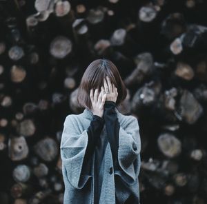 Close-up of woman standing in park