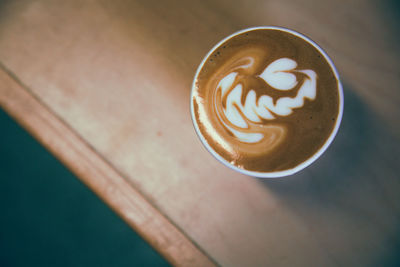 Close-up of cappuccino on table