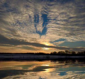 Scenic view of sea at sunset