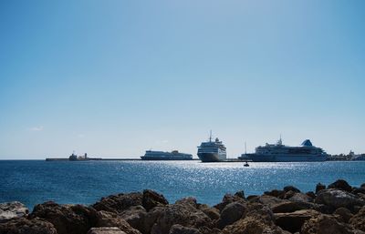 Panoramic view of sea against blue sky