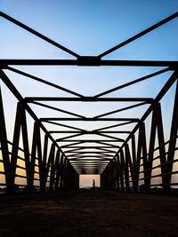 Bridge against clear sky during sunset