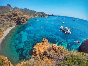 Scenic view of sea against clear blue sky