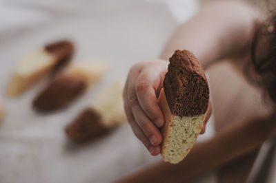 Close-up of hand holding ice cream