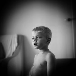 Portrait of shirtless boy at home