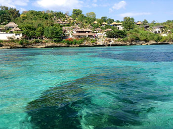 View of swimming pool against cloudy sky