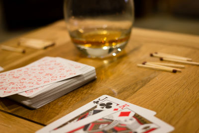 Playing cards on wooden table