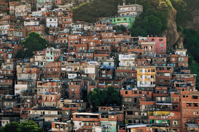 Buildings by mountain in city