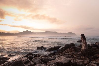 Scenic view of sea at sunset