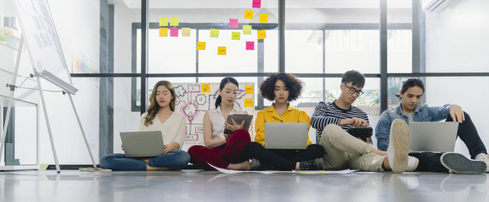 Group of people using laptop