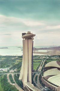 High angle view of city against cloudy sky