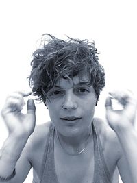 Close-up portrait of young man standing outdoors