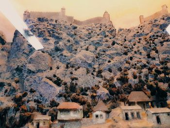 View of castle on mountain against sky