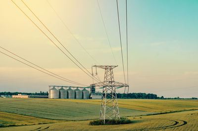 Metal support is a pillar of a high-voltage line in the field. big elevator