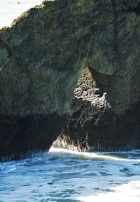 Scenic view of rock formation in sea