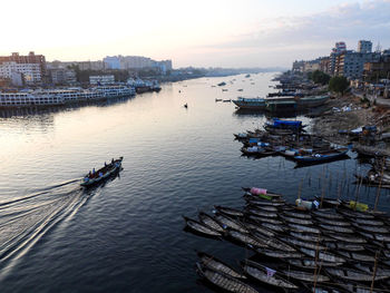 High angle view of river amidst buildings in city