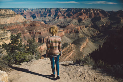 Rear view of woman at grand canyon