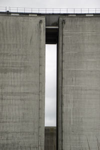 Low angle view of bridge against building