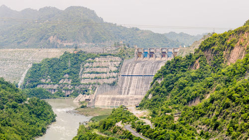 Ravi river flowing through the mountains, the ranjit sagar dam, thein dam