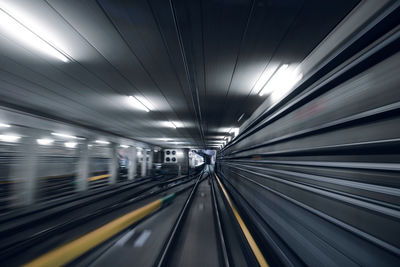 Blurred motion of train at subway station