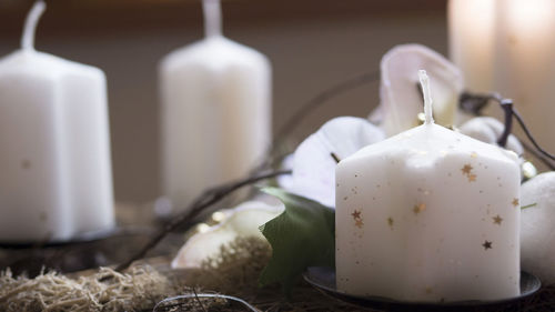 Close-up of white candles